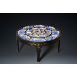 An exceptionally large Chinese Canton enamel rice table or sweetmeat set in its original Canton gilt