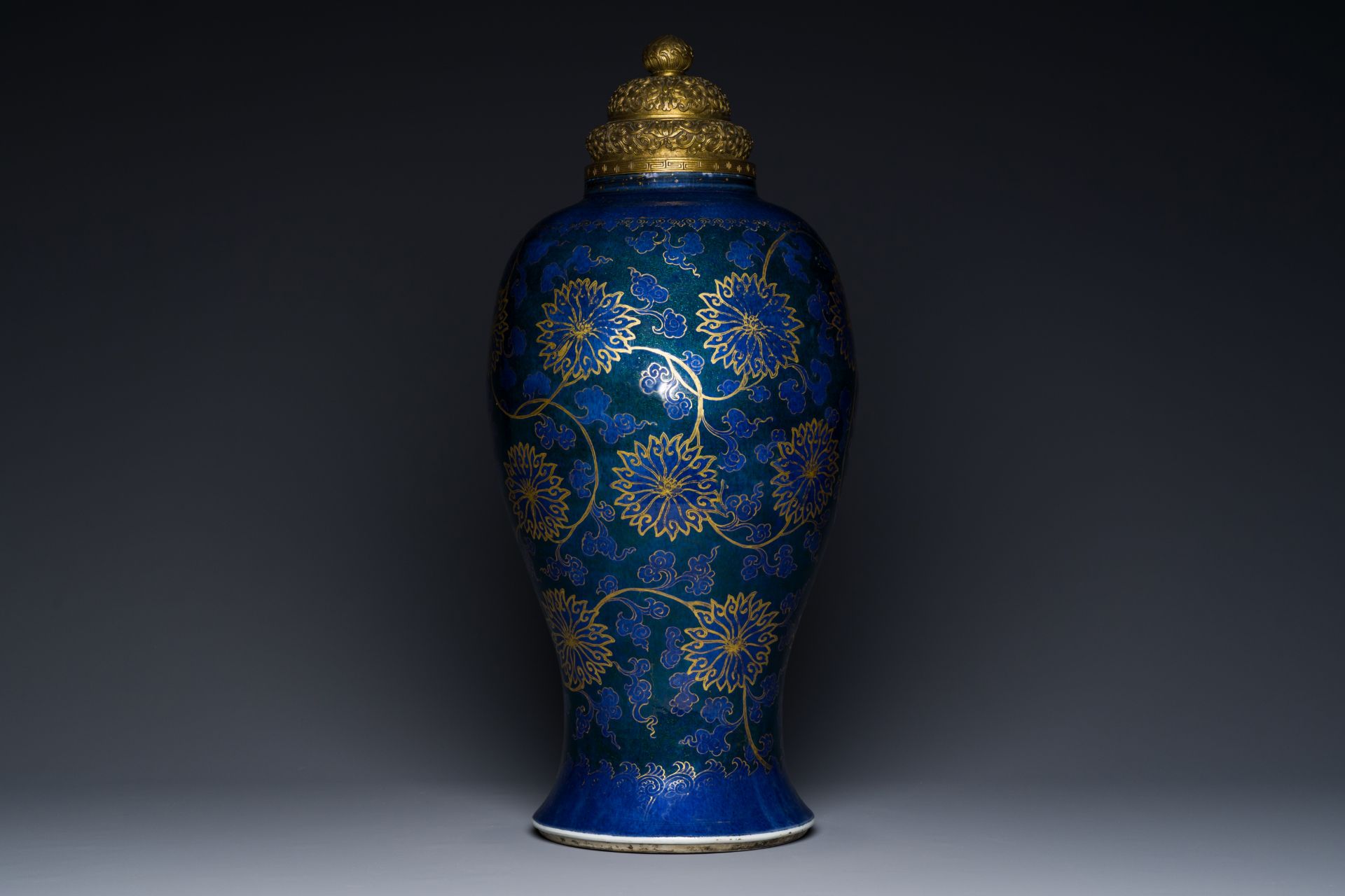 A Chinese powder-blue vase with gilt lotus scrolls and a matching gilt cover, Kangxi