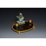 A French lacquered and painted wood, gilt bronze and Japanese celadon porcelain inkwell desk set, la