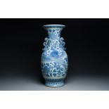 A large Chinese blue and white dragon-handled 'phoenix and peony' vase, 19th C.