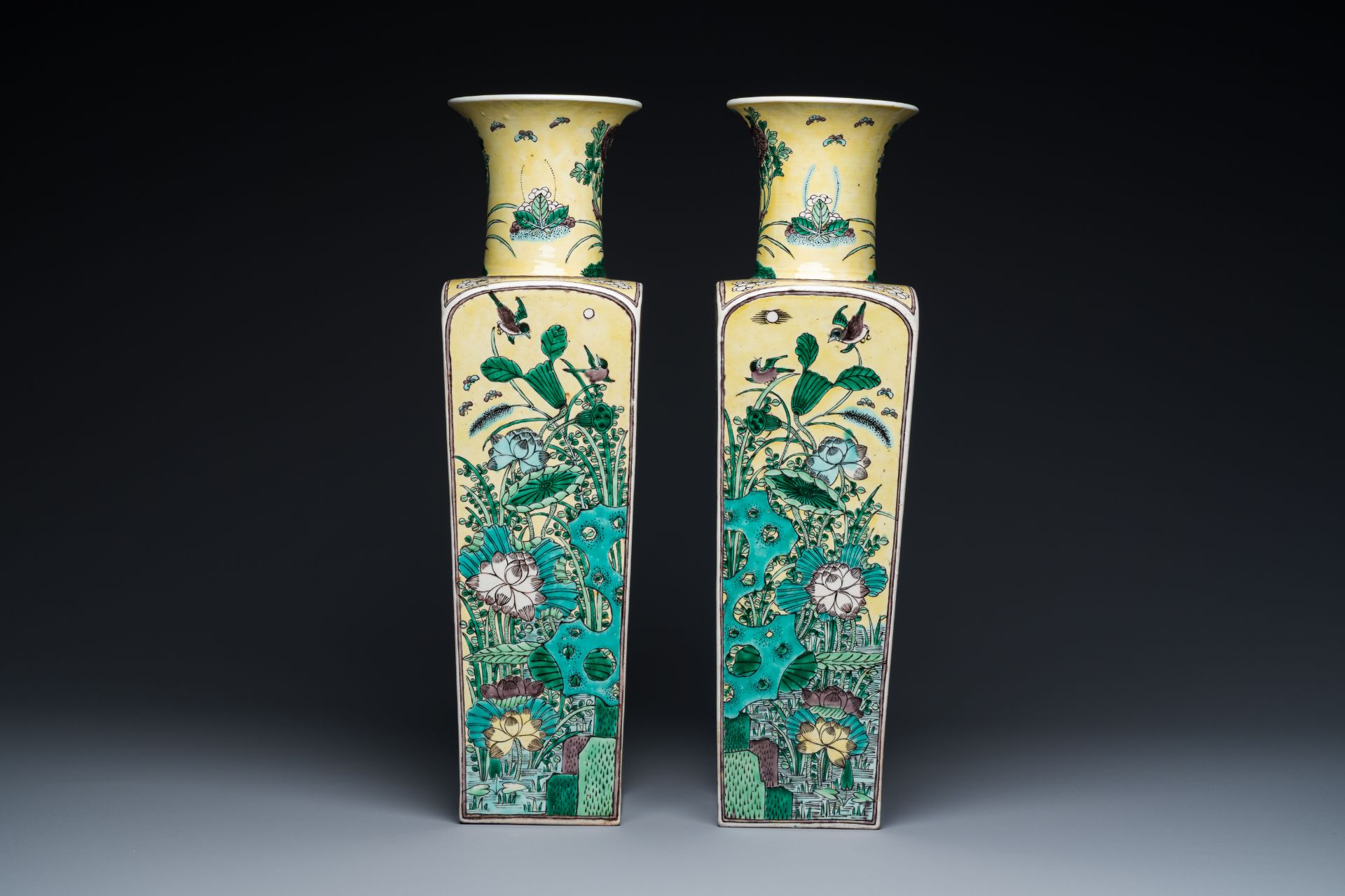 A pair of Chinese square yellow-ground famille verte vases, Kangxi mark, 19th C. - Image 4 of 7
