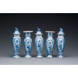 A small blue and white Dutch Delft garniture of five vases, 18th C.