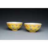 A pair of Chinese famille rose yellow-ground 'butterfly' bowls, Tongzhi mark and of the period