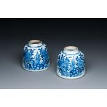 A pair of Chinese blue and white bell-shaped water pots, Kangxi