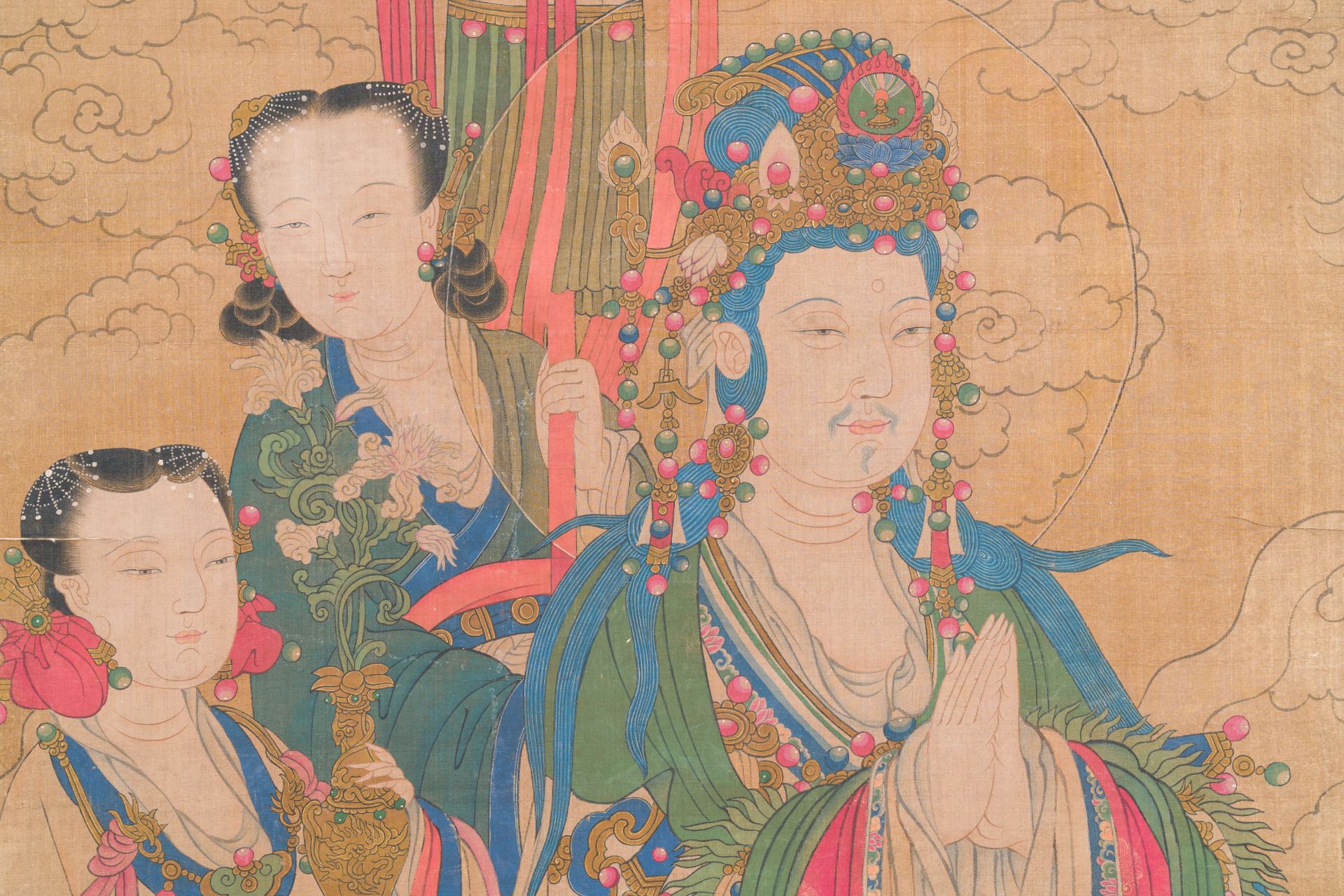 Chinese school: 'Bodhisattva with two servants', ink and colour on silk, 18/19th C.