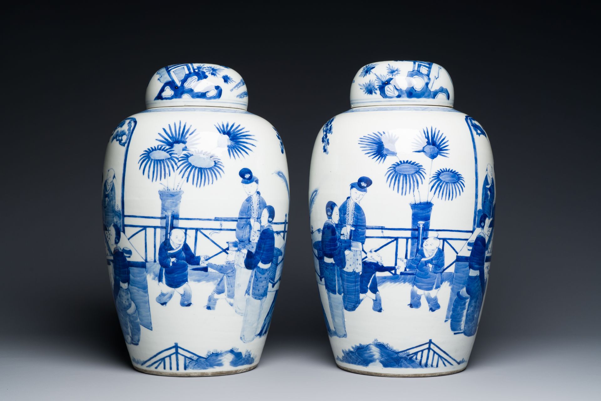 A pair of large Chinese blue and white jars and covers with ladies playing a game of go, 19th C. - Image 2 of 6