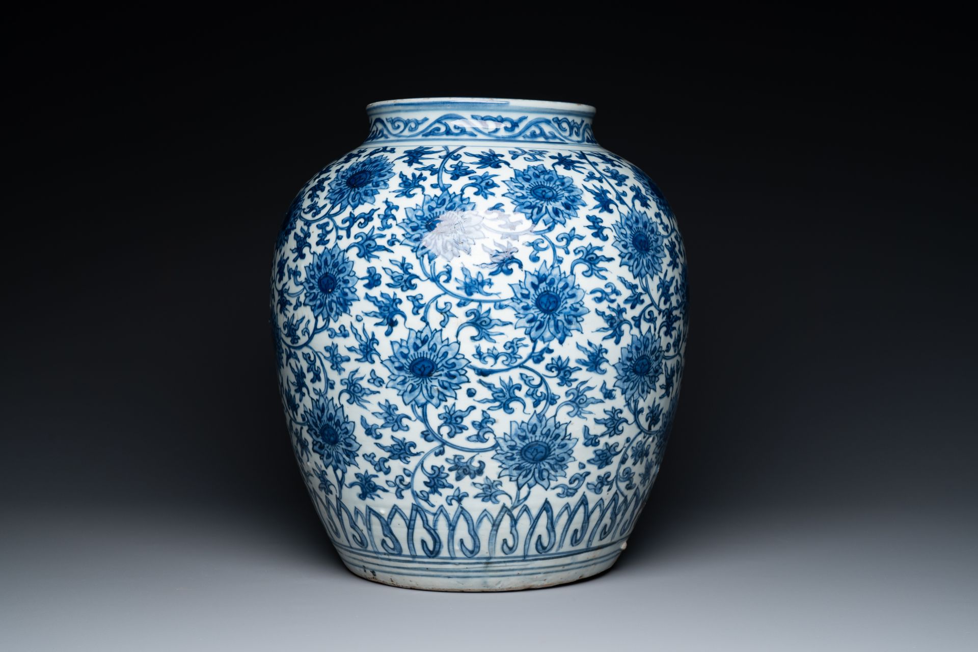 A large Chinese blue and white 'lotus scroll' jar, Ming - Image 4 of 6