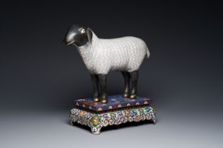 A Chinese cloisonne model of a sheep standing on a rectangular base with Arabic inscription, Qing