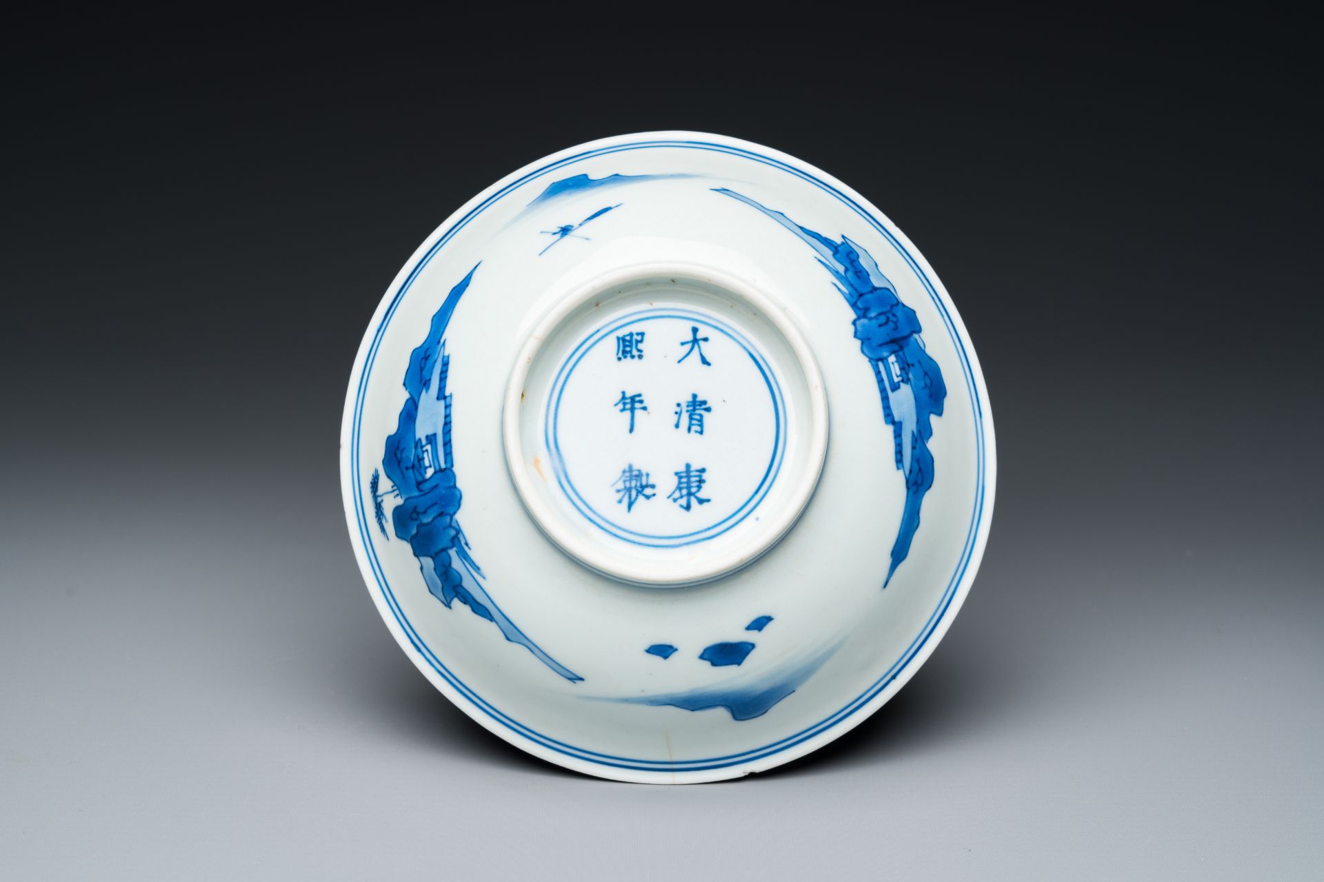 A Chinese blue and white shallow bowl, Kangxi mark and of the period - Image 2 of 2