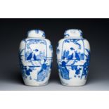 A pair of large Chinese blue and white jars and covers with ladies playing a game of go, 19th C.