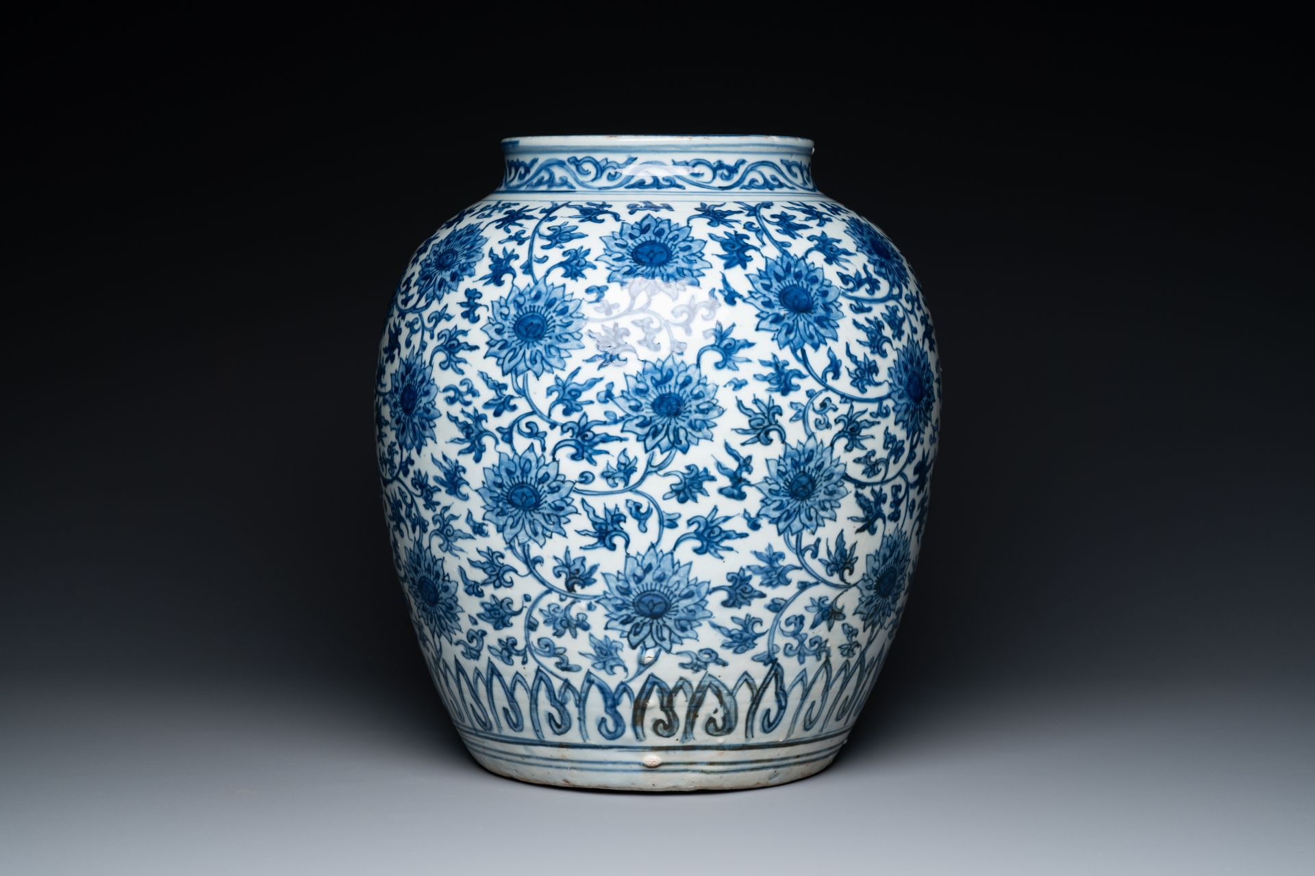 A large Chinese blue and white 'lotus scroll' jar, Ming