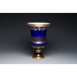 A Sevres porcelain Medici vase with gilt decoration on a vibrant blue ground, France, dated 1847 and