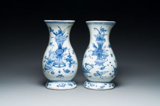 A pair of Chinese blue and white wall pocket vases with antiquities, Kangxi