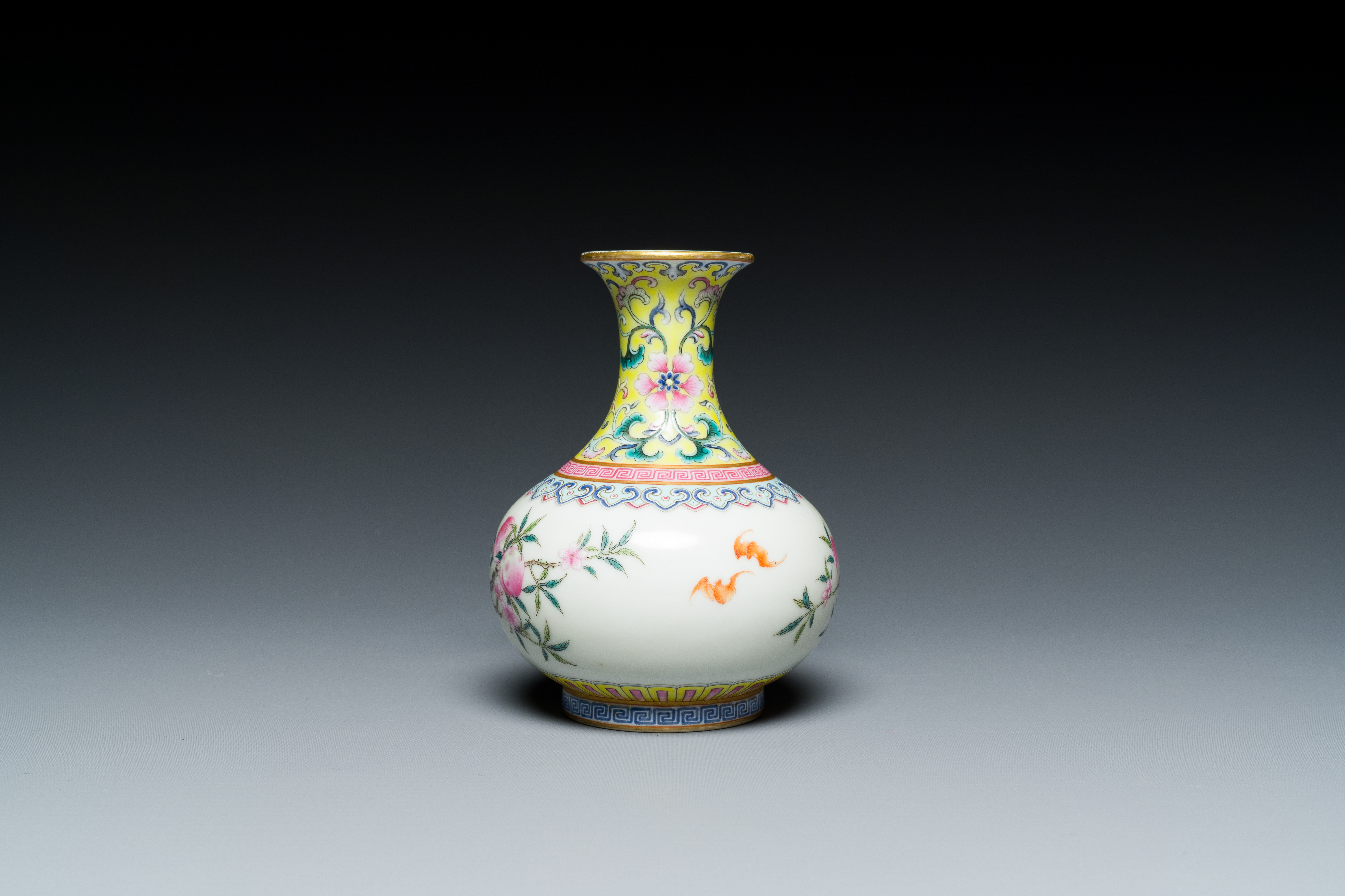 A small Chinese famille rose 'nine peaches' bottle vase, Jiaqing mark, 20th C. - Image 4 of 7