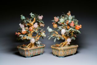 A pair of Chinese precious stone and lacquer trees in cloisonne jardinieres, 19/20th C.