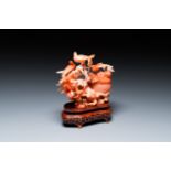 A Chinese carnelian agate sculpture of a vase with branches and birds, 20th C.