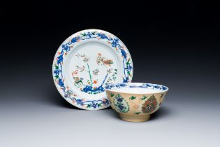 A Chinese famille verte 'phoenix and kylin' plate and a bowl for the Persian market, Kangxi