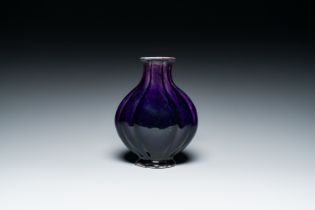 A Chinese monochrome aubergine-glazed vase, 19th C.