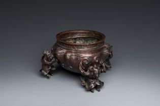 A Chinese lacquered bronze 'foreigners' censer, Ming