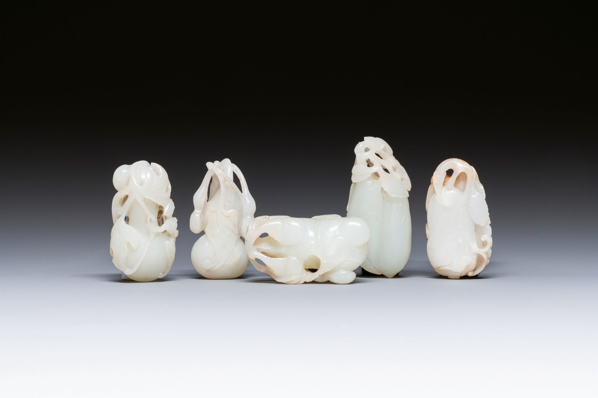 Five Chinese white and celadon jade carvings, Qing/Republic