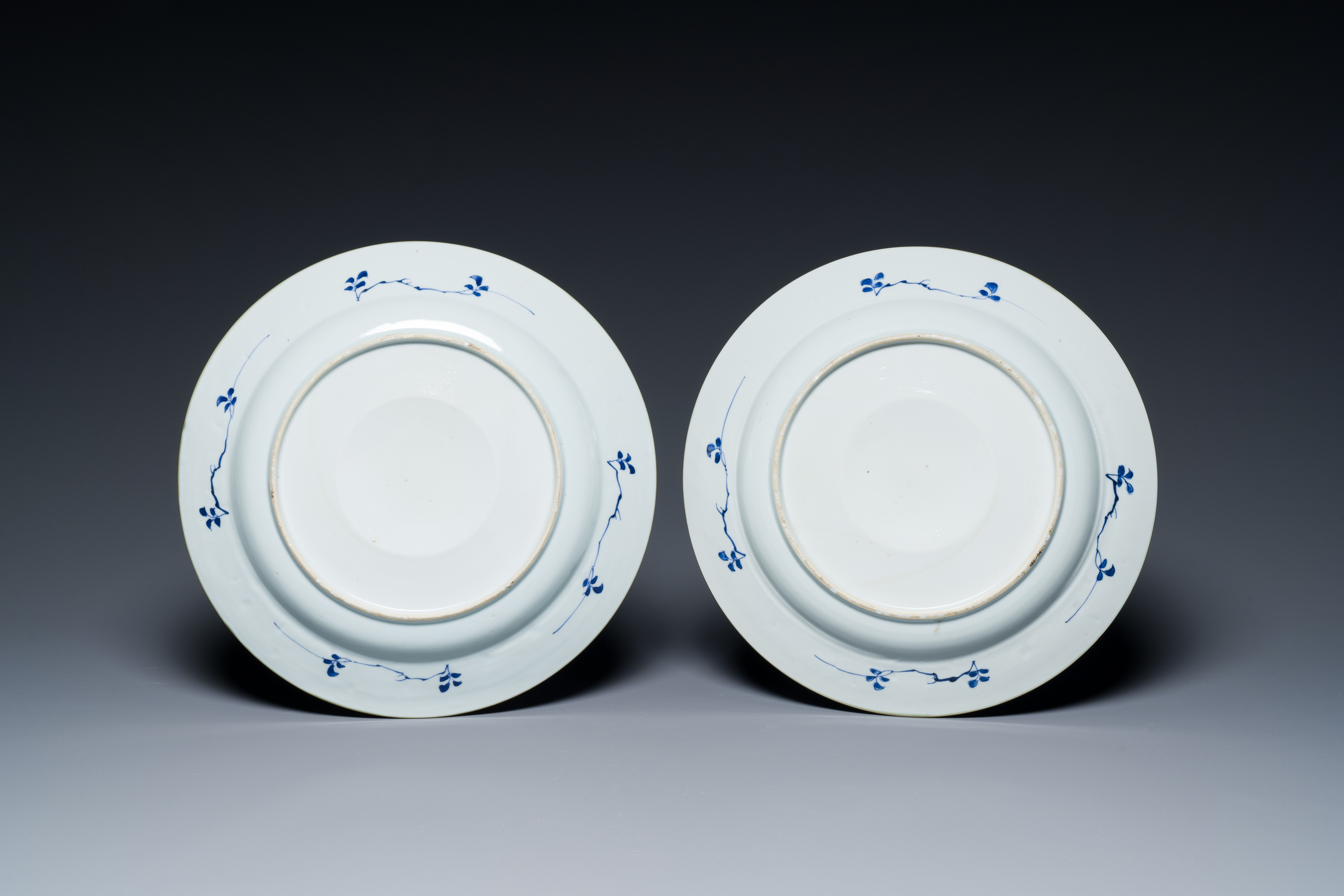 A pair of Chinese blue and white dishes with raised central medallions, Kangxi - Image 2 of 2