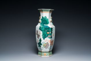 A Chinese hexagonal famille verte 'Buddhist lions and deer' vase, 19th C.