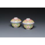A pair of Chinese Canton enamel bowls and covers, Qianlong