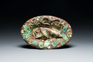 A French oval dish with applied fish in Palissy-style maiolica, Victor Barbizet (1808-1884), 19th C.