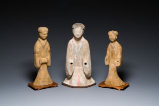 Three Chinese polychromed pottery figures of ladies, Han
