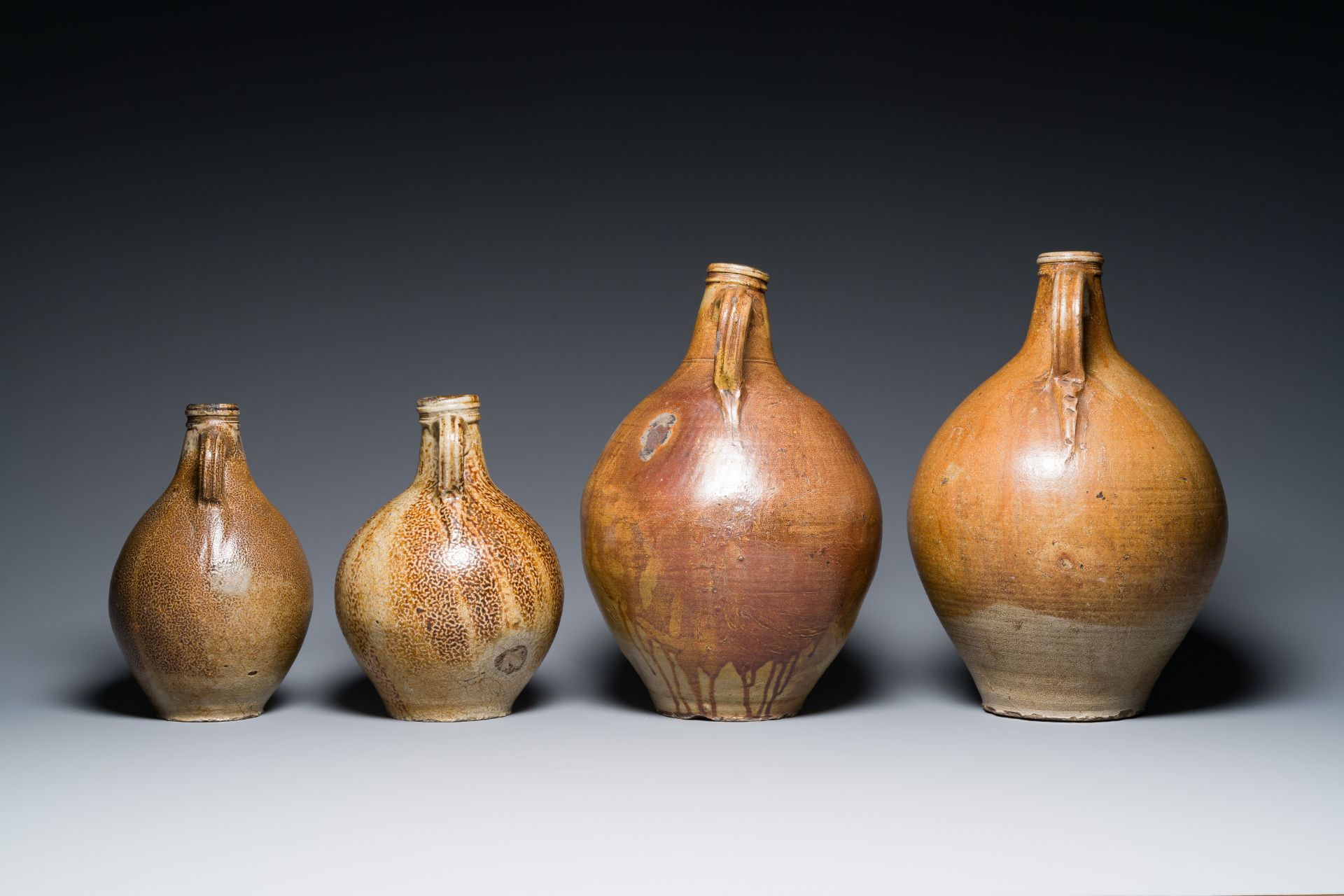 Four stoneware bellarmine jugs with various seals, Frechen and Cologne, Germany, early 17th C. - Image 3 of 7