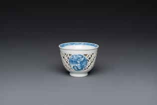 A rare Chinese reticulated double-walled blue and white 'phoenix' cup, Kangxi