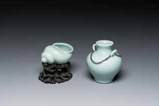 A Chinese celadon-glazed water pot on wooden stand and a small 'hu' vase, 19/20th C.
