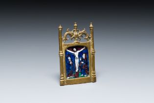 A gilt-bronze pax with a Limoges enamel 'Crucifixion' plaque, France, 1st half 16th C.