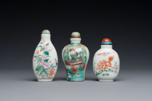 Three Chinese famille rose and verte snuff bottles, 19th C.