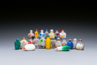 A varied collection of Chinese snuff bottles in glass, hardstone and jade, 19/20th C.