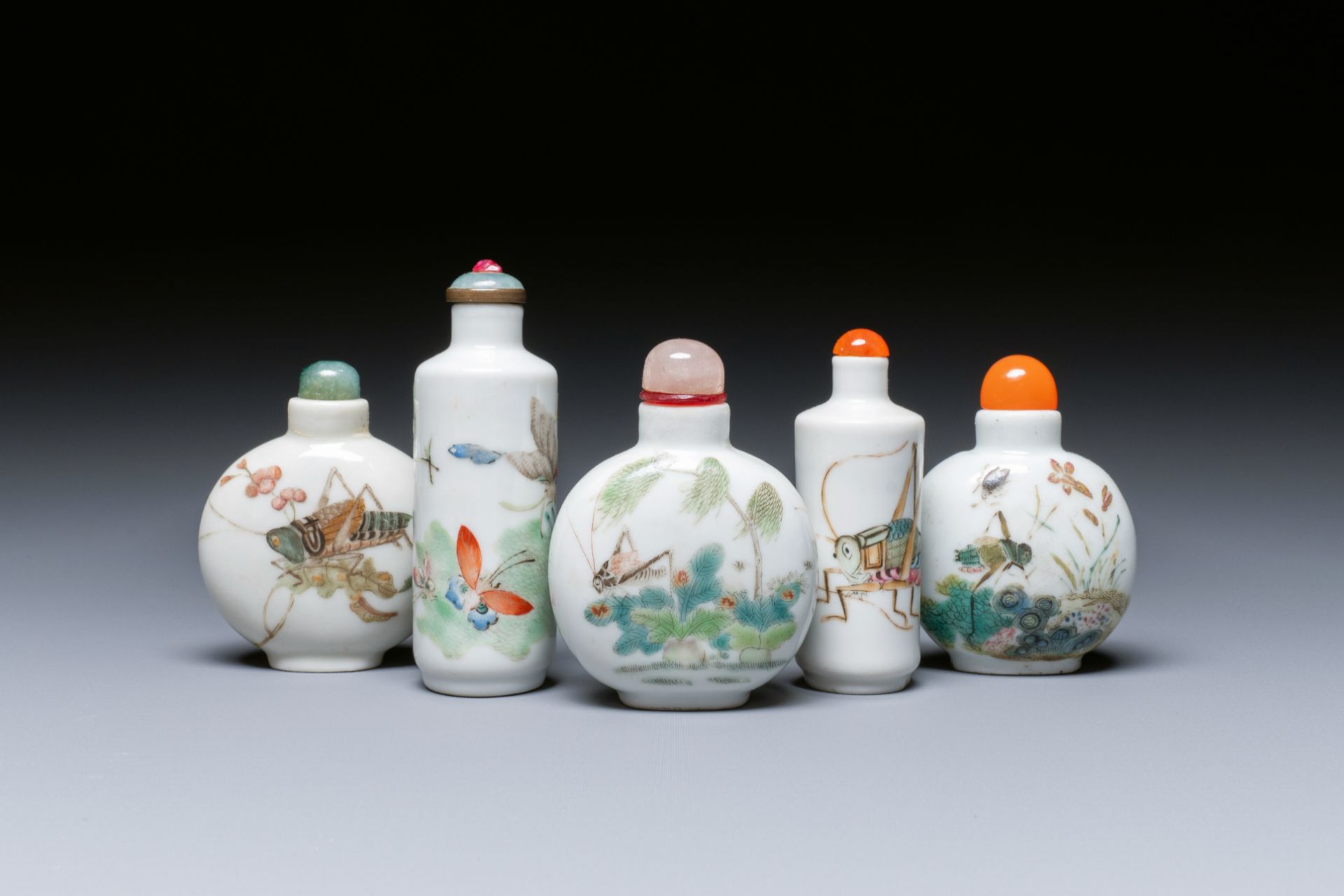 Five Chinese famille rose 'grasshopper' and 'butterfly' snuff bottles, 19/20th C.