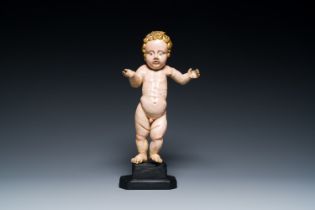 A polychromed wood sculpture of the Infant Christ with a moveable arm, Southern Europe, 17/18th C.