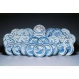 A large Chinese blue and white dish and 26 plates, Kangxi/Qianlong