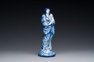 A rare Dutch Delft blue and white Madonna and Child, dated 1738