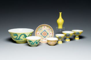 A varied collection of Chinese yellow-ground porcelain, 19/20th C.