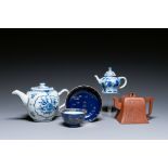 Two Chinese blue and white teapots, one in Yixing stoneware and a powder-blue cup and saucer, Kangxi