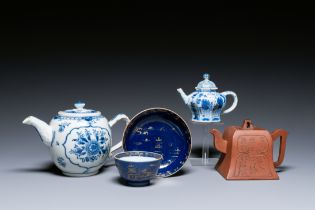 Two Chinese blue and white teapots, one in Yixing stoneware and a powder-blue cup and saucer, Kangxi