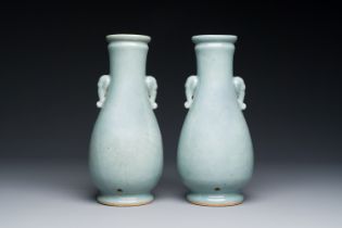 A pair of Chinese monochrome lavender-blue-glazed 'hu' vases, 19th C.