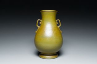 A Chinese monochrome teadust-glazed 'hu' vase, Qianlong mark, 19/20th C.