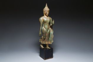 A large Thai partly gilt bronze sculpture of Buddha, probably Sukhotai period, 15th C.