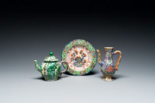 A Chinese clobbered blue and white ewer, a plate and a verte biscuit teapot, Kangxi