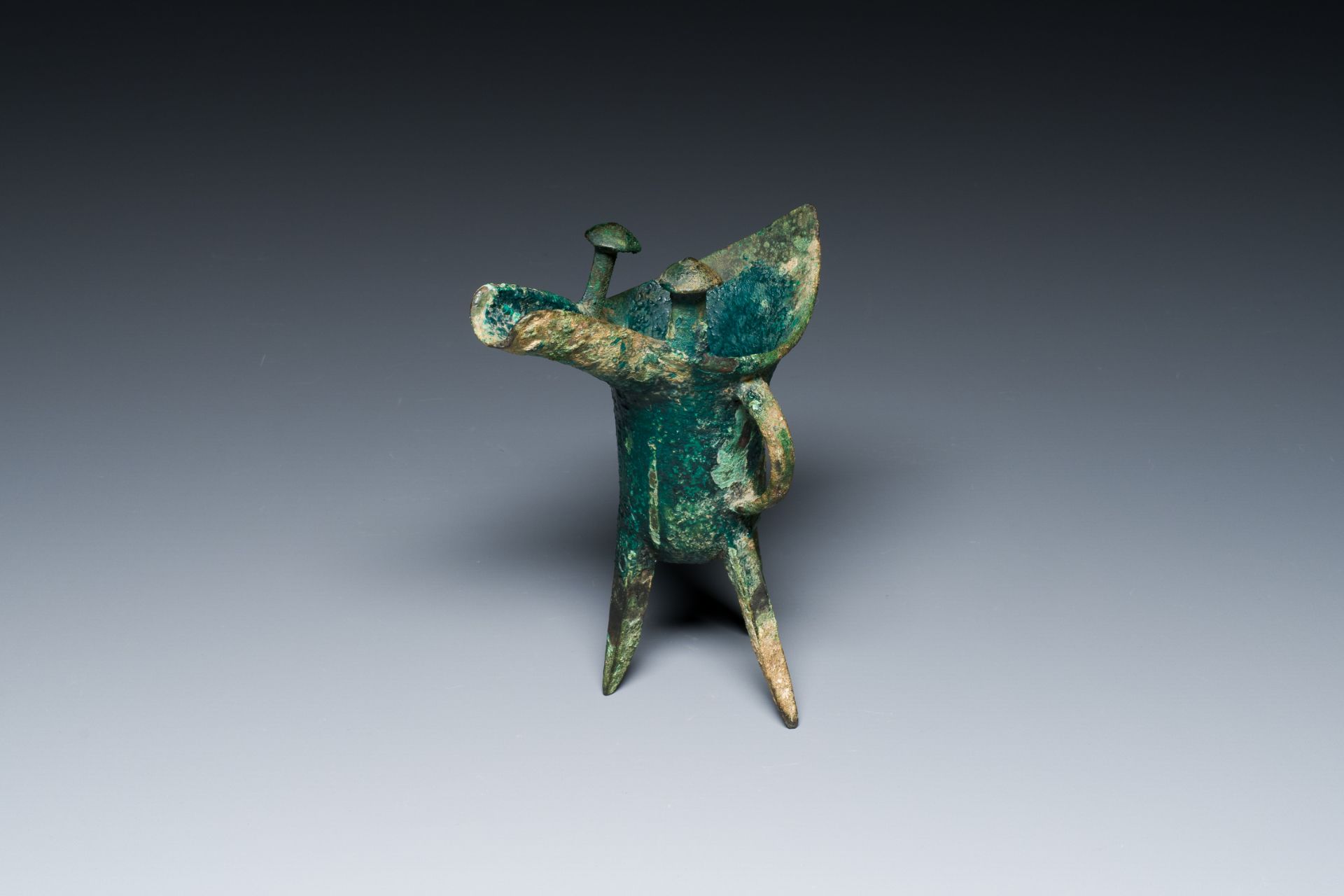 A Chinese archaic bronze ritual wine vessel, 'jue', late Shang dynasty