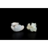 Two Chinese white jade carvings of a mandarin duck and of a ram with his lamb, Qing