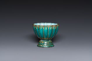 An unusual Chinese gilt-decorated green-ground Canton enamel flower-shaped stem bowl, ex-coll. Harry