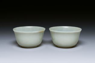 A pair of Chinese pale celadon jade bowls, 19th C.